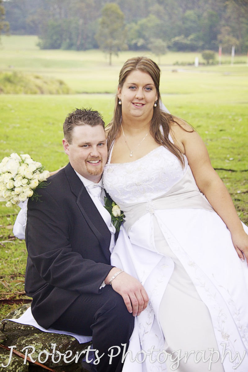 Bride sitting on grooms lap - wedding photography sydney